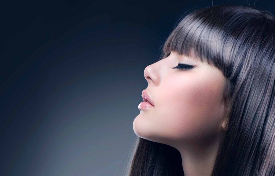 Glossy blunt-cut bob with a sharp fringe — cut and colour at Hair Barn in Tyler, Texas